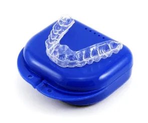 Ultra Thin Guard — clear custom dental night guard shown with its case
